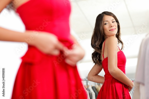Girl trying dress