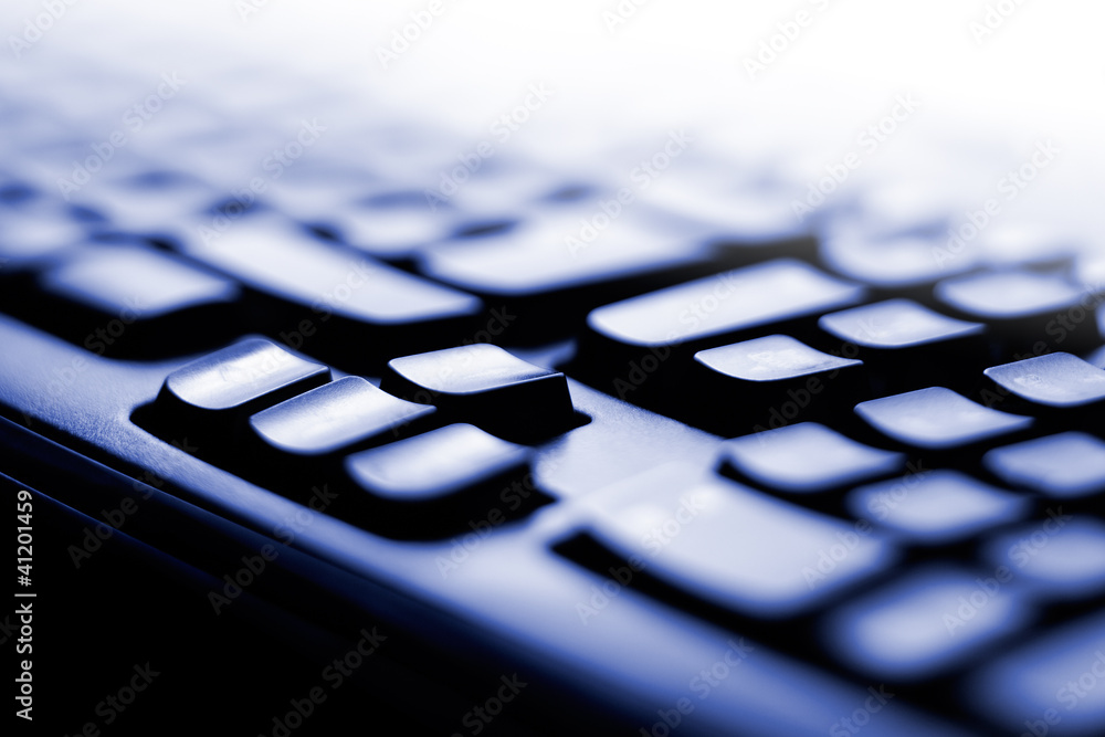 a close up of a blue computer keyboard