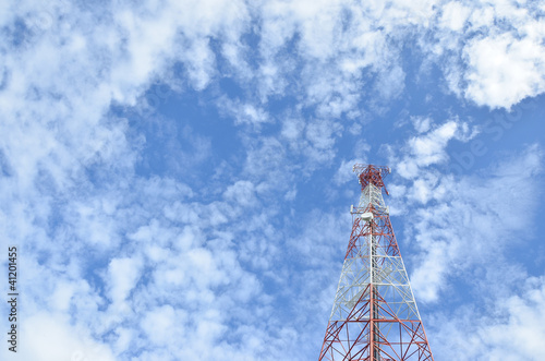 The telecommunications tower with beautiful clouds