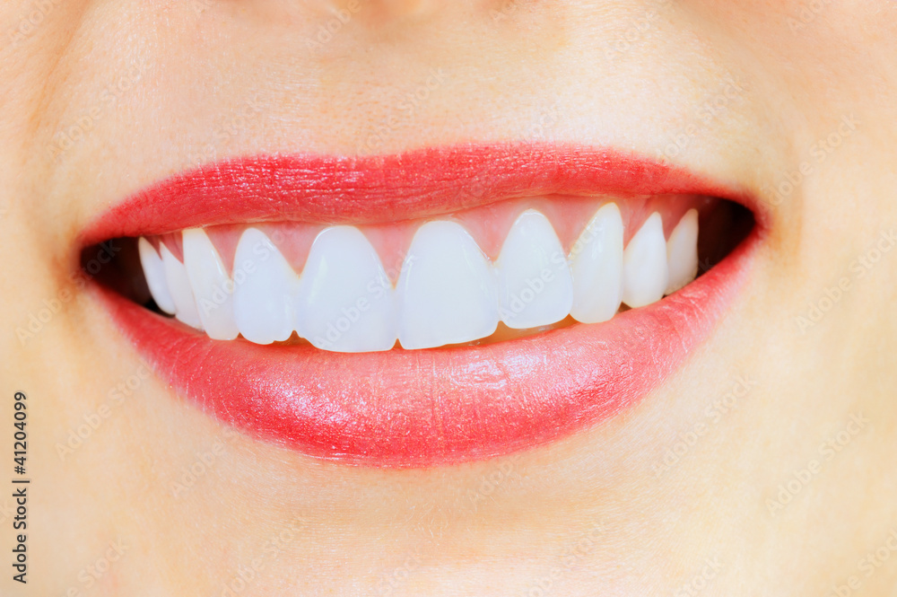 Fototapeta premium Smiling woman with great healthy white teeth