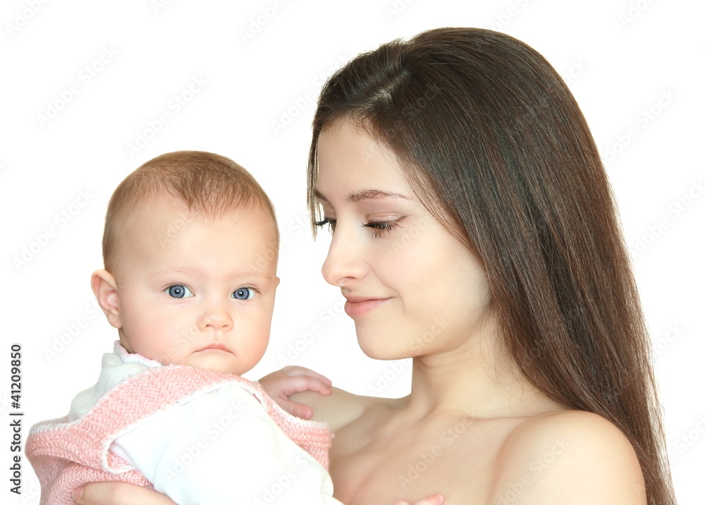 Mother embracing beautiful baby and looking with love. Isolated Mother embracing beautiful baby and looking with love. Isolated