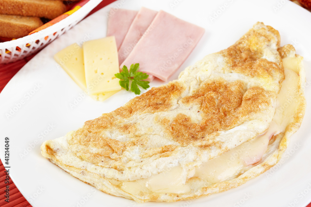 Breakfast. Omelette with cheese and ham