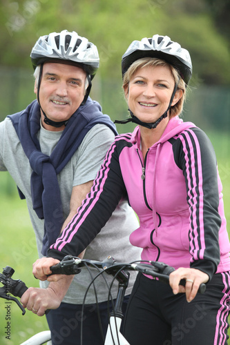 Senior couple having a bike ride