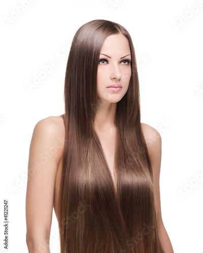young woman with elegant long healthy shiny hair