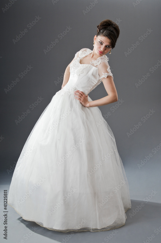 Bride in wedding dress in studio shooting Bride in wedding dress in studio shooting