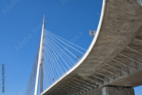 Fototapeta Naklejka Na Ścianę i Meble -  Overpass to bridge over blue sky