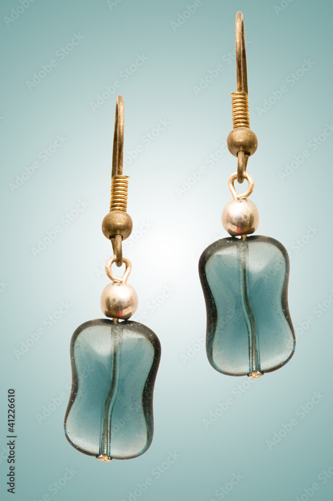 Beauty fashion concept with earrings Beauty fashion concept with earrings