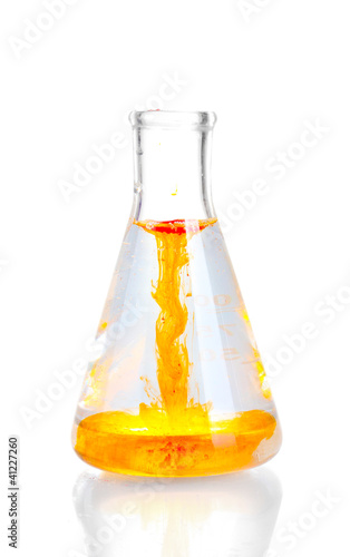 brightly ink in a flask with water isolated on white