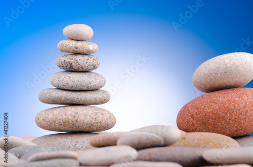 Pebbles stack against gradient background