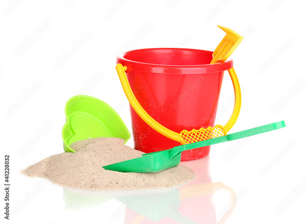 Children's beach toys and sand isolated on white Children's beach toys and sand isolated on white