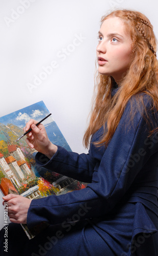 Girl painting photo