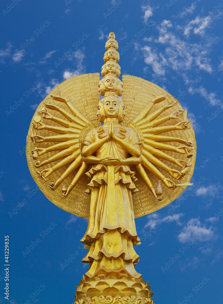Obraz premium Guan Yin with ten thousand hands on blue sky