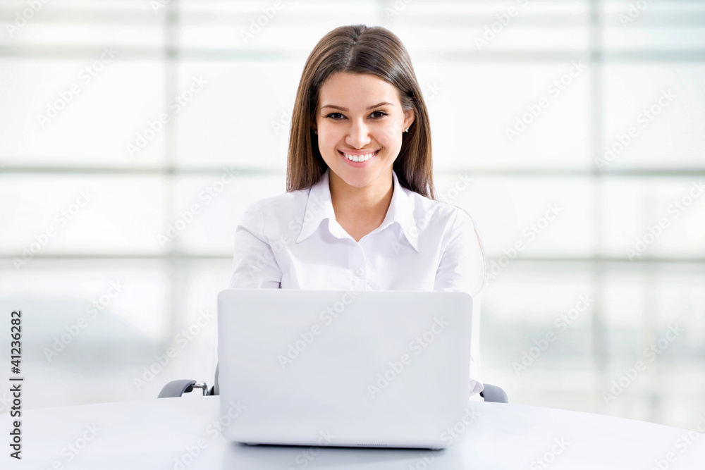 Business woman working on laptop Business woman working on laptop