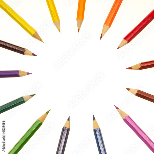 Color pencils in arrange in color wheel colors on white backgrou © ijdema