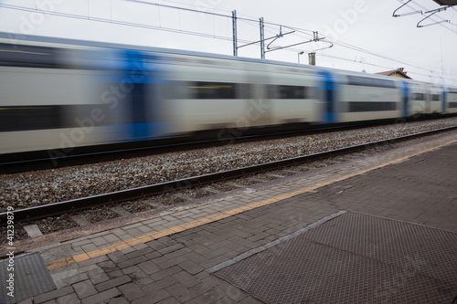 Panning on a moving fast train. Turin, italy.