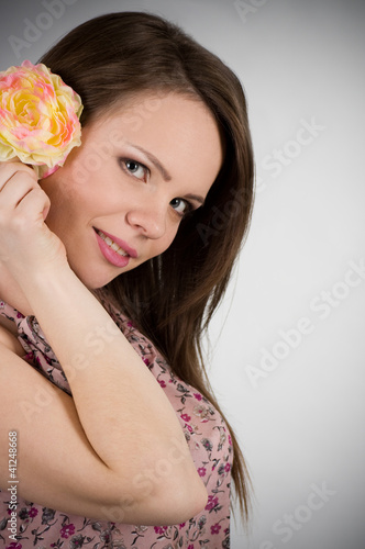 Fototapeta Naklejka Na Ścianę i Meble -  Beautiful young woman on dark background