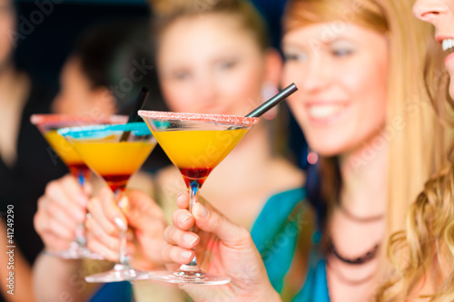 Photography People in club or bar drinking cocktails