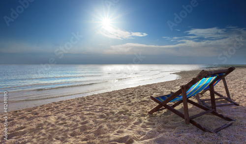 couples of wood bed  on sand beach © stockphoto mania