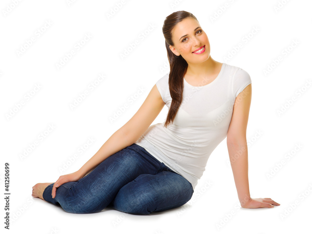 Young woman sitting on the floor