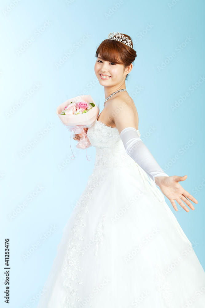 Beautiful asian woman dressed as a bride