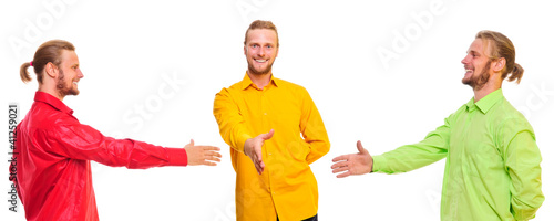 three men shake hands