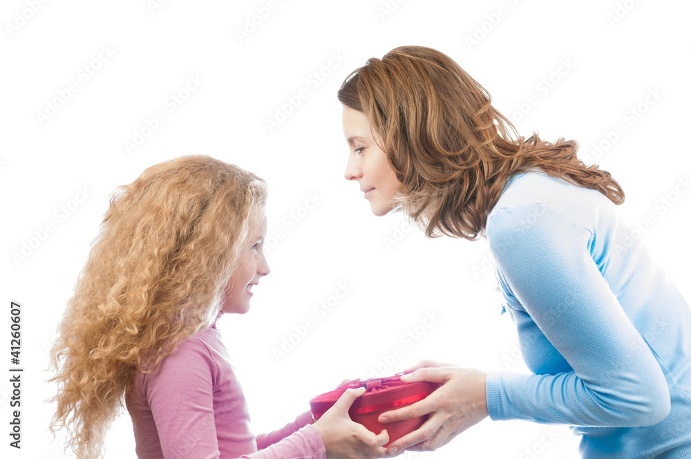Fototapeta premium Mother giving present to daughter.
