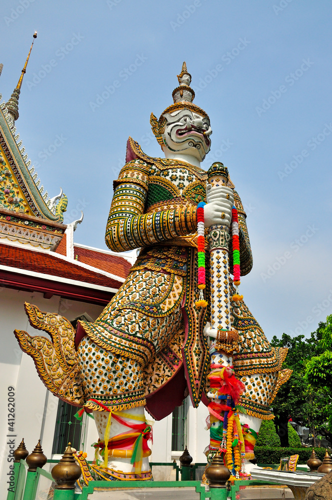 Fototapeta premium White Demon Guardian at Wat Arun, Bangkok, Thailand