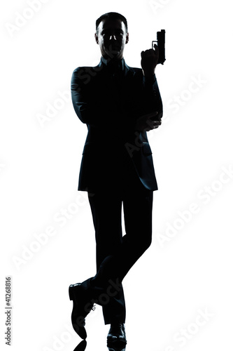 Tableau sur toile silhouette man full length secret agent in a james bond posture