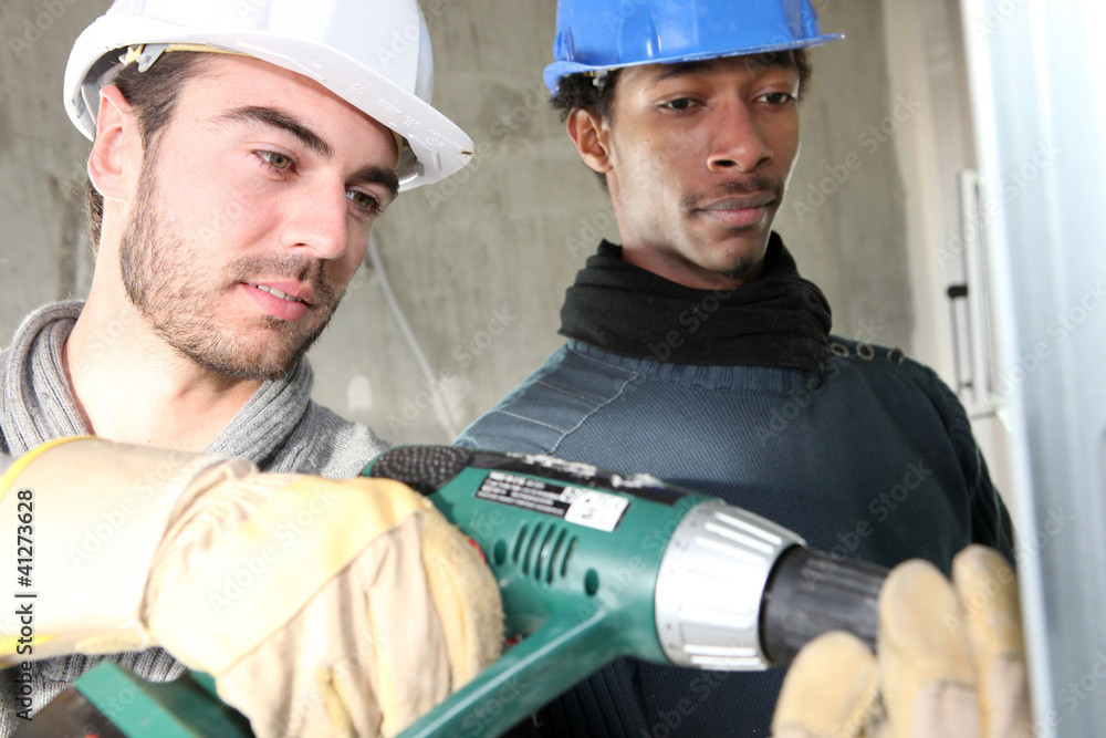 Worker with drill Worker with drill