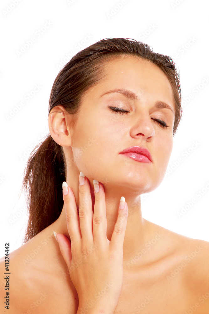 A beautiful woman touching her face, isolated on white A beautiful woman touching her face, isolated on white