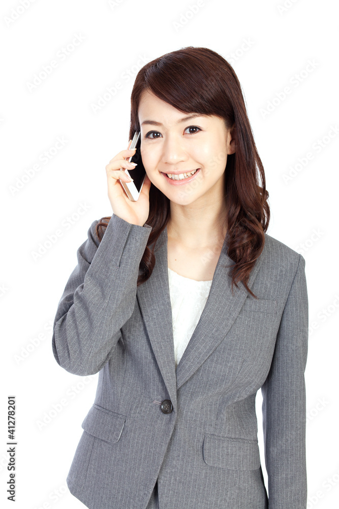 Beautiful business woman using a mobile phone Beautiful business woman using a mobile phone