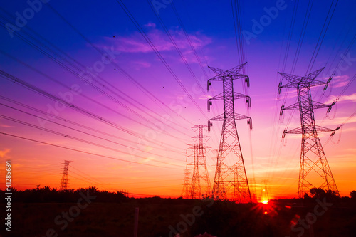 Electricity pylons at sunset