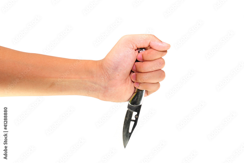 A small pairing knife in hand A small pairing knife in hand