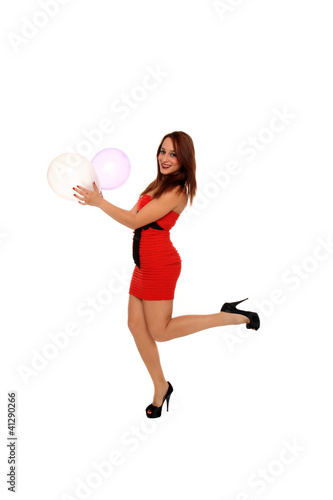 portrait of a young girl holding balloons © smoxx