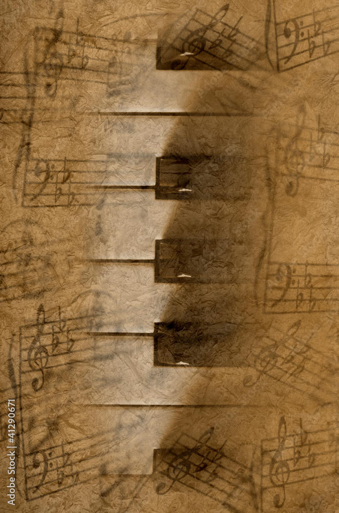 Obraz premium Teclas de piano con notas musicales