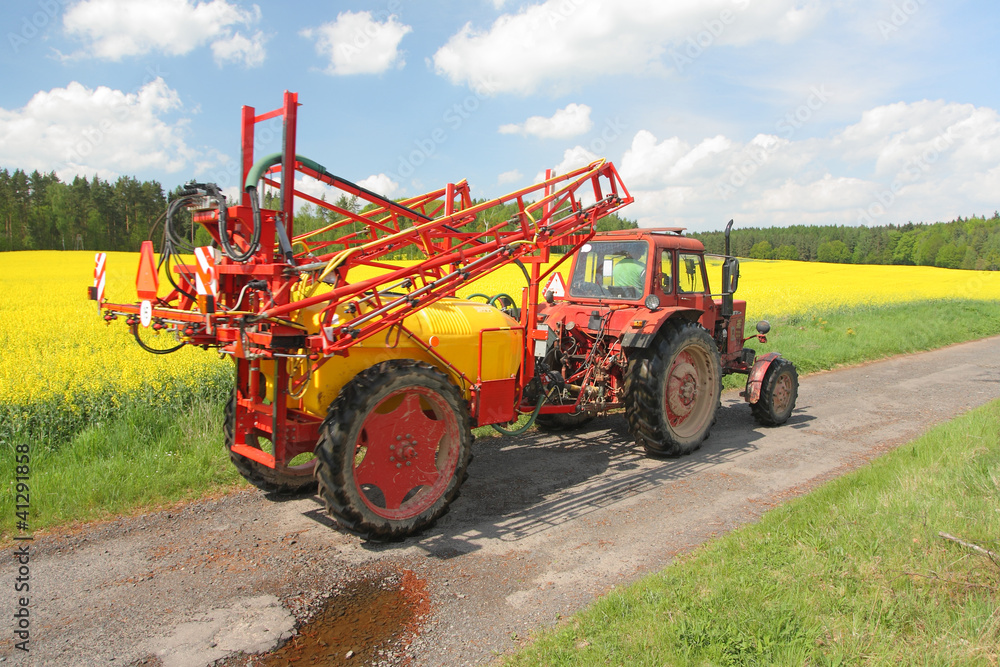 Fototapeta premium Tractor with a spraying instalation