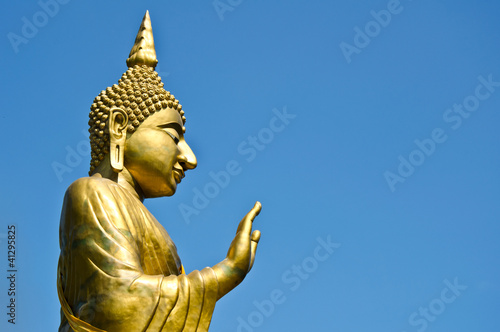 big gold image of buddha