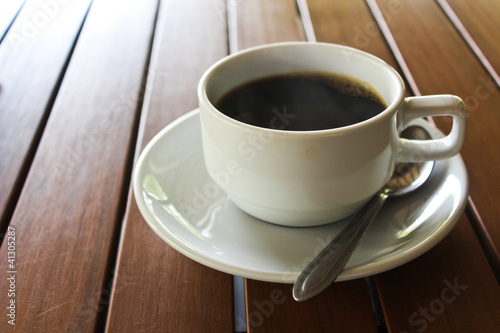 Black Coffee white cup on the table.