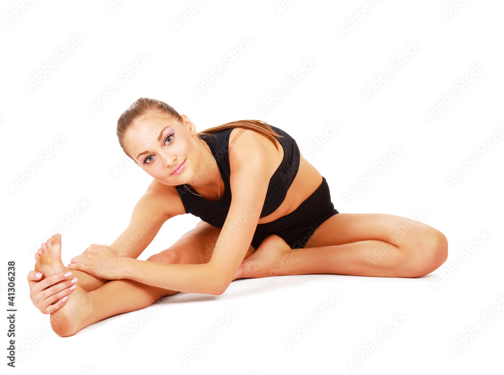 smiling woman doing stretching excersises smiling woman doing stretching excersises