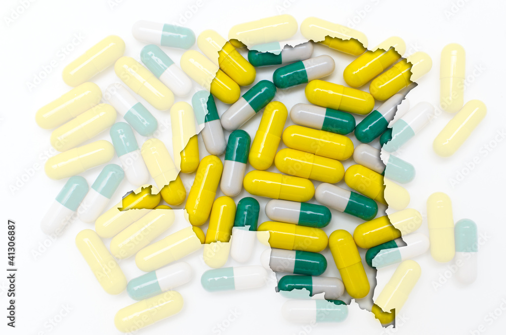 Outline map of congo with pills in the background for health and Outline map of congo with pills in the background for health and