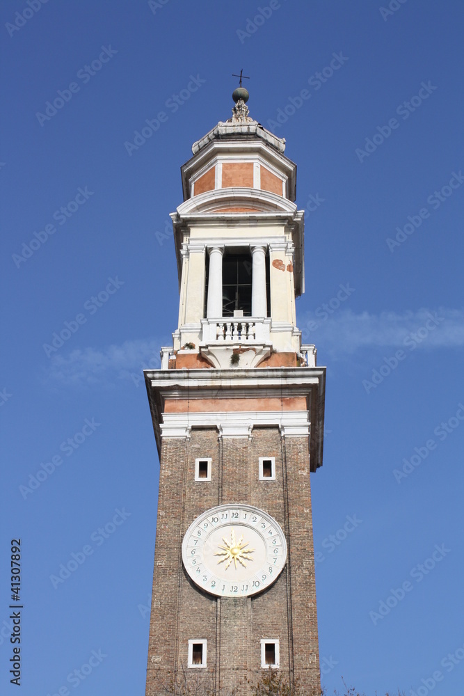 Bell tower of Santi Apostoli church in venice ( Italy )
