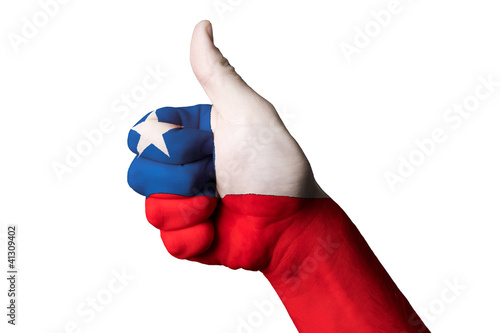 chile national flag thumb up gesture for excellence and achievem photo