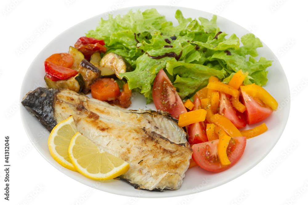 fried fish with vegetables and salad