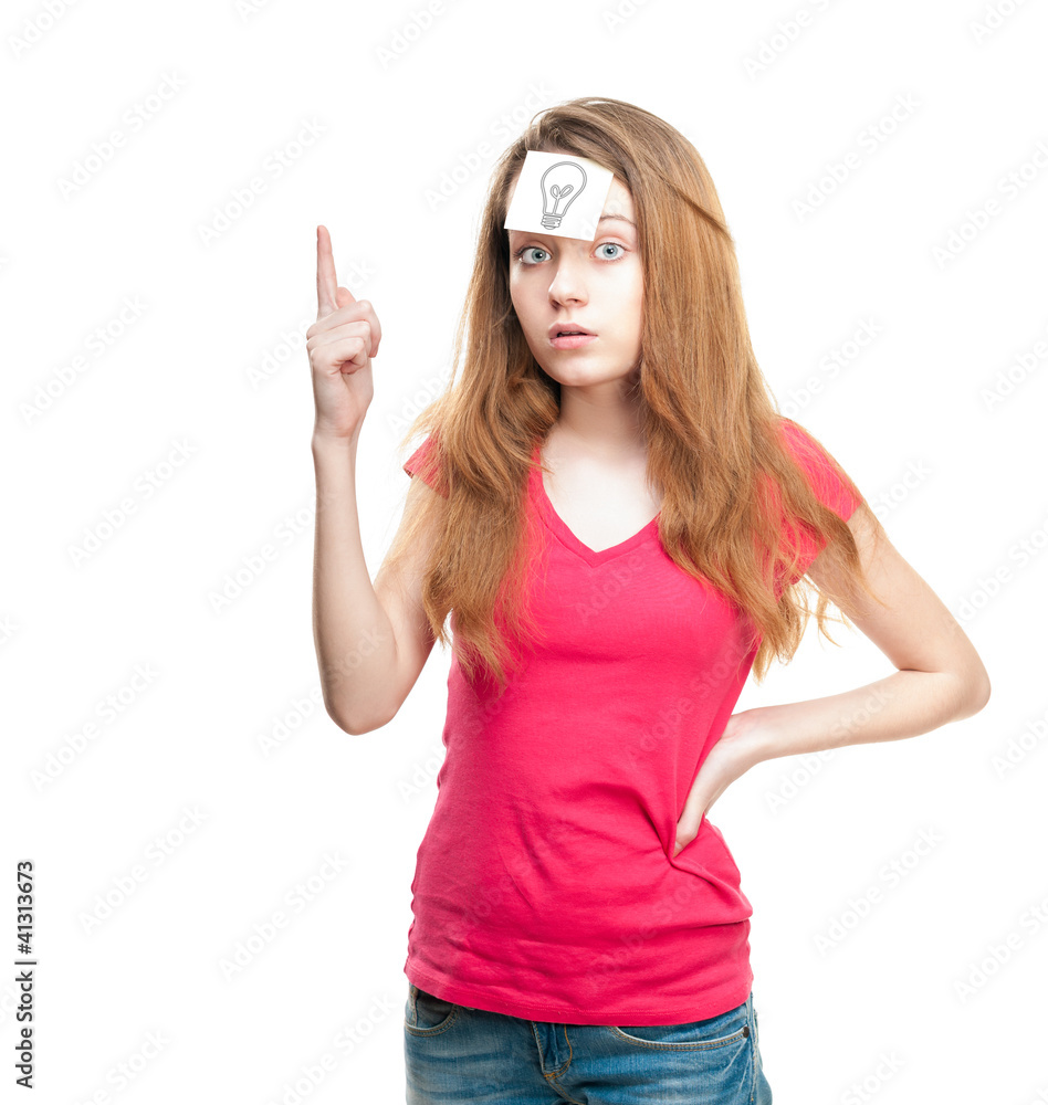 Girl with light bulb on paper on her forehead. Girl with light bulb on paper on her forehead.