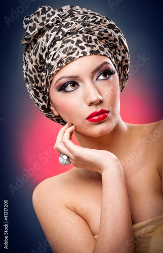creative portrait of beautiful girl with turban