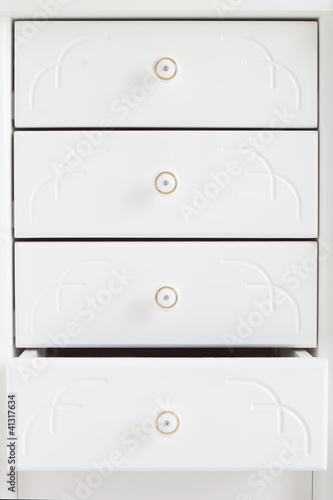 White wooden drawers.