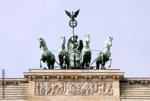 Photography Quadriga Monument Over Brandenbourg Gate in Berlin (Germany), with in the foreground, the star of a Berlin's typical street lamp, oblique view