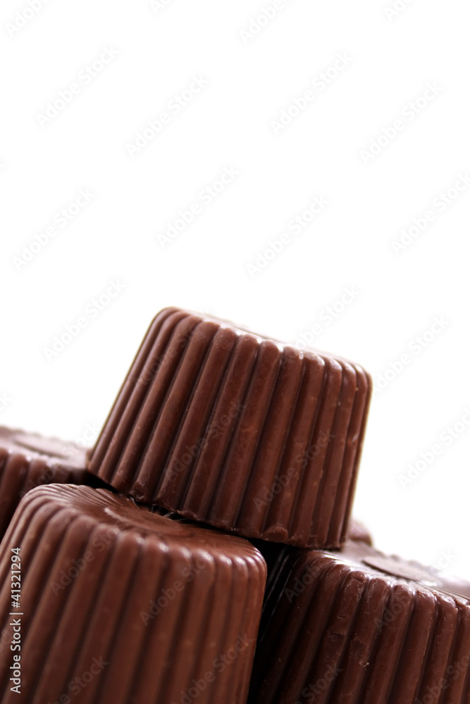 Naklejka premium Rounded chocolate from corner