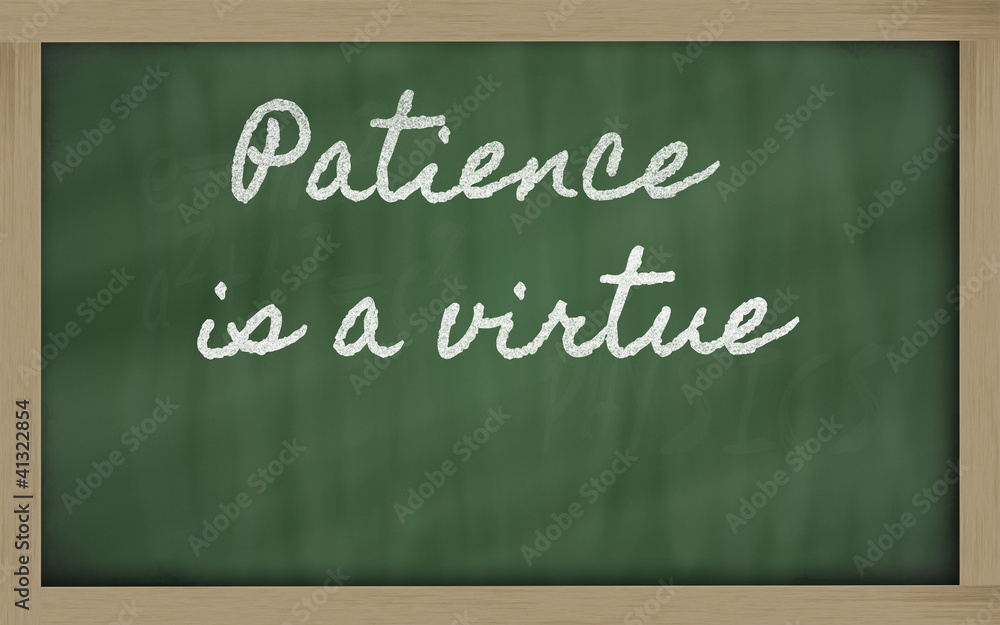 Obraz premium expression - Patience is a virtue - written on a school blackbo