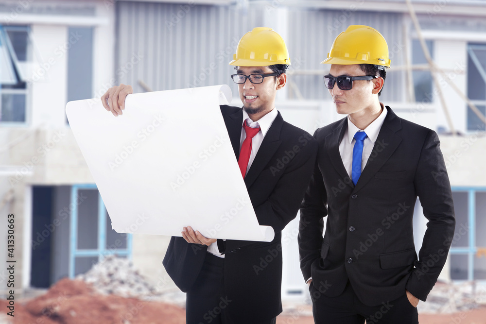 Engineers at construction site Engineers at construction site